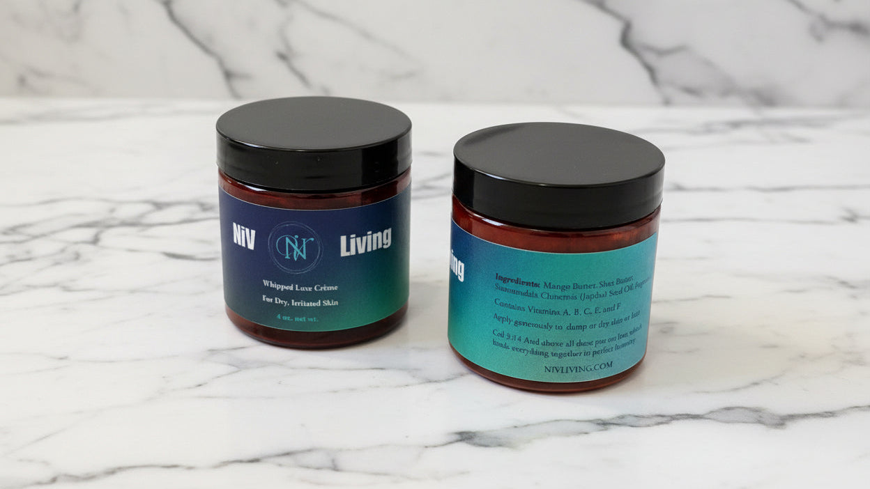 Two jars of hair product on a marble surface